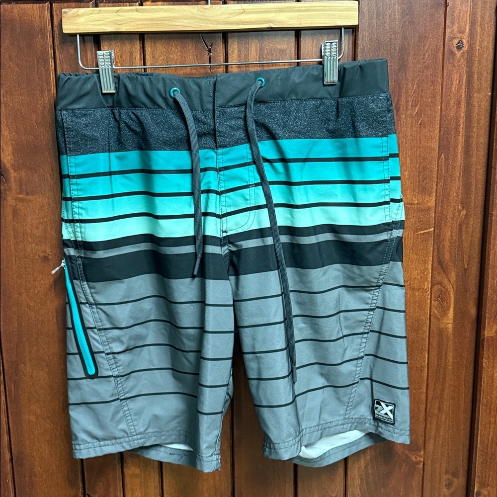 ZeroXposur Gray and Teal swimming trunks